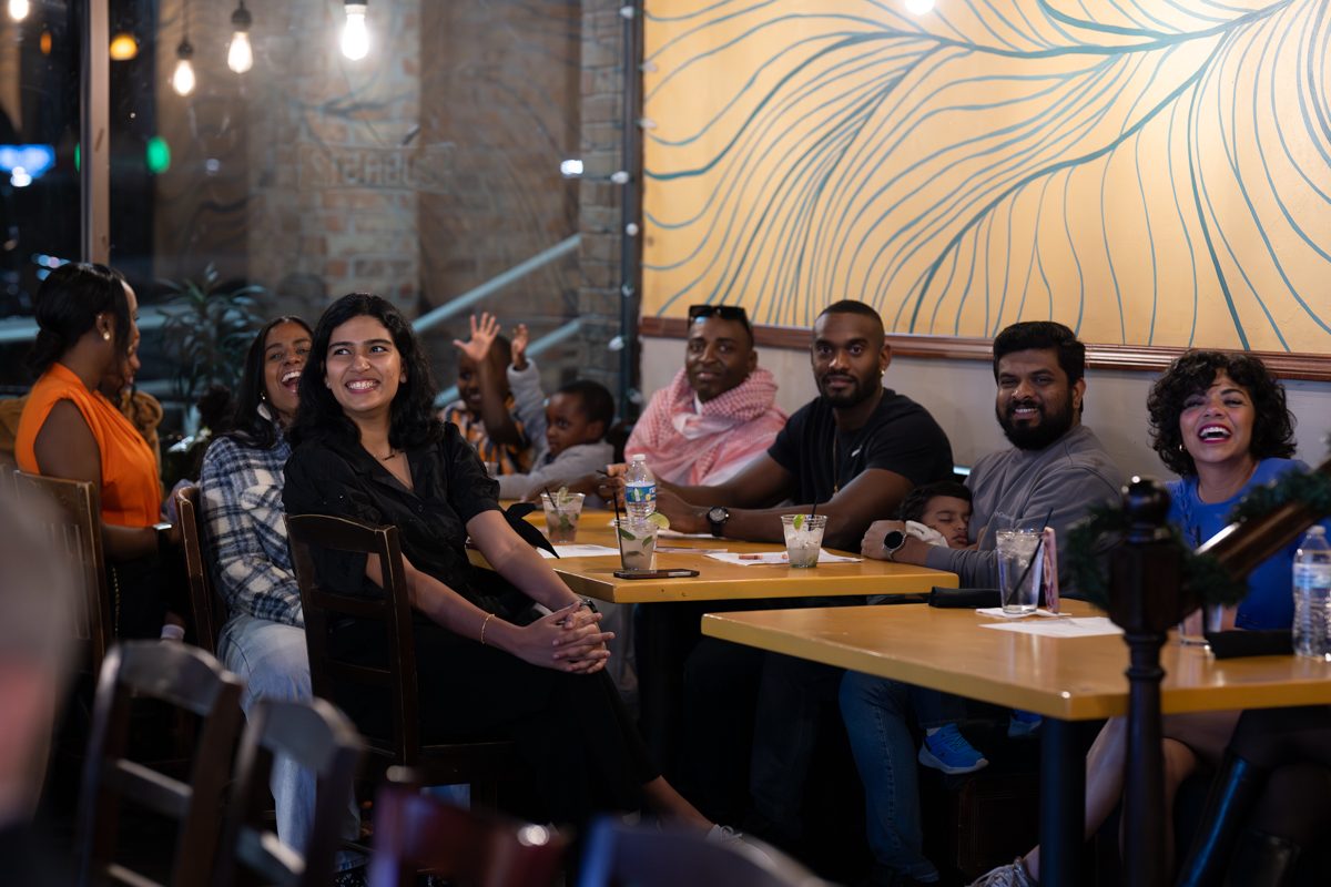 Guests at a Purple Jam Dine-O-Rama dinner in Austin